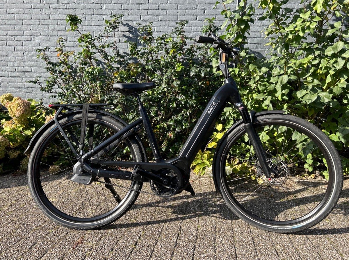 Foto van Dutch ID Phantom 85 Tr Auto Belt Kiox Blac Dames matt zwart 48cm 2021 (2021) via Bike Totaal Cameron